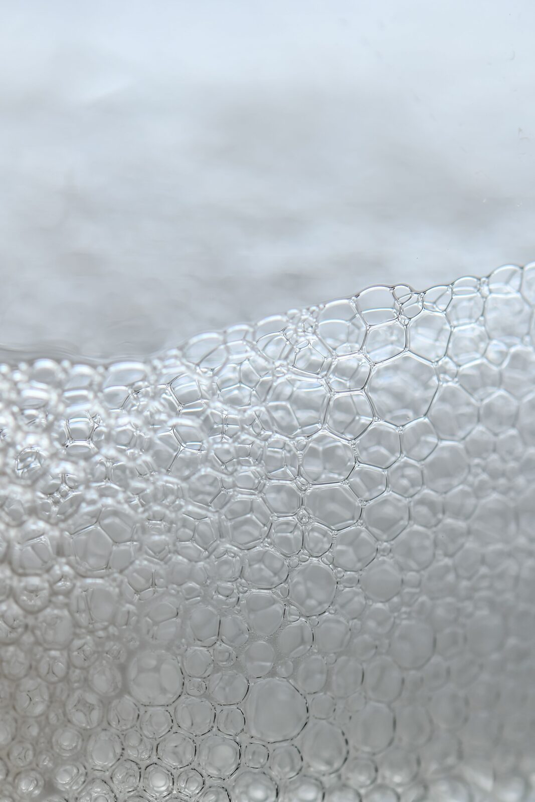 A close-up of dense white foam bubbles